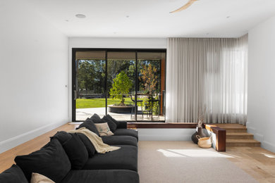 This is an example of a contemporary living room in Sydney.