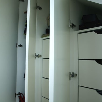 Contemporary fitted wardrobes for loft bedroom in London, UK