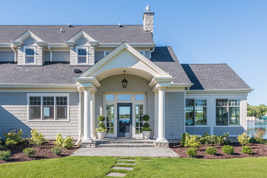 Large elegant gray two-story wood gable roof photo in Minneapolis
