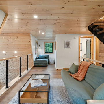 Embracing Inspiration: The Perfect Pairing of Cable Railings and Wooden Handrail