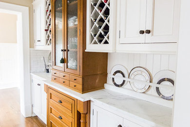 Eat-in kitchen - traditional eat-in kitchen idea in Other with two islands