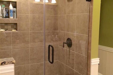 Example of a transitional bathroom design in Other