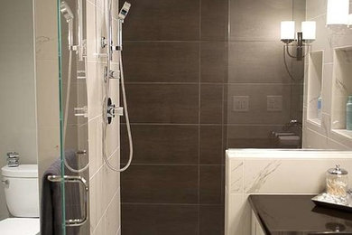 Small transitional master white tile and porcelain tile porcelain tile bathroom photo in Milwaukee with an undermount sink, recessed-panel cabinets, white cabinets, quartzite countertops, a one-piece toilet and gray walls
