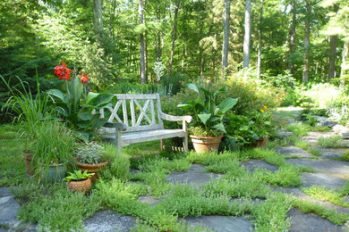 Inspiration for a large rustic full sun backyard stone garden path in New York for summer.