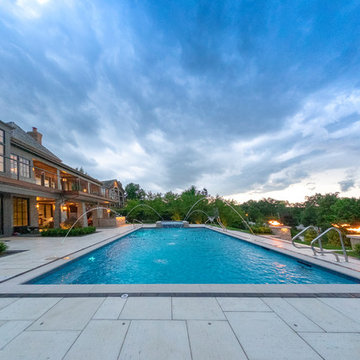 Burr Ridge Lap Pool with Raised Hot Tub and Waterfall