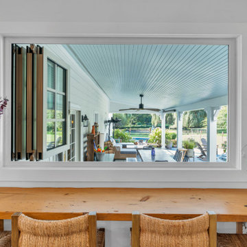 A NJ Sunroom: Harmonious Blending of Inside to Out with Wood Framed Patio Doors