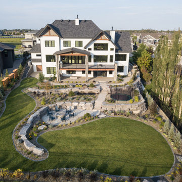 Luxury Backyard Retreat with Armour Stone & Water Feature | Genesis on the Lakes