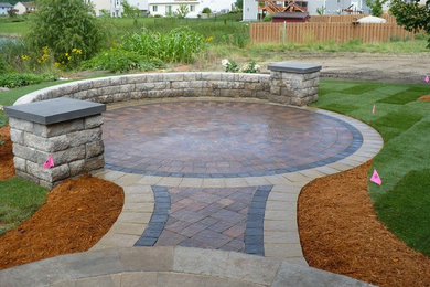 Inspiration for a large traditional full sun backyard brick outdoor basketball/tennis/multi-game court in Minneapolis for summer.