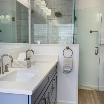Spacious Bathroom with Dual Vanity and Freestanding Tub