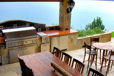 This is an example of a mediterranean porch design in Austin.