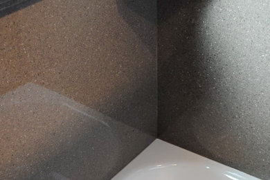 Inspiration for a large modern master gray tile and marble tile marble floor and gray floor bathroom remodel in Kansas City with recessed-panel cabinets, white cabinets, granite countertops, gray countertops, a one-piece toilet, gray walls and a vessel sink