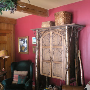 Example of an eclectic home theater design in Burlington