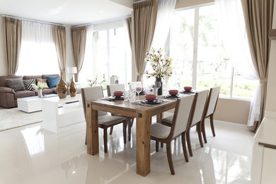 Example of a mid-sized trendy white floor great room design in Miami with brown walls and no fireplace