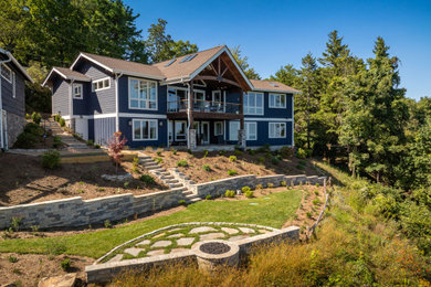 Example of a transitional exterior home design in Other