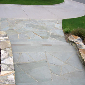Grand staircase landings, cheek walls and columns; Mahogany driveway