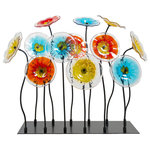 Dale Tiffany - Sculpture Figurine DALE TIFFANY 12-Piece Flower Garden Rectangular - Item #:DY-1969Overall measurements (inches)31.75H x 40W x 13L .This festive 12 Piece Flower Garden Sculpture is a colorful addition to any room's decor. The generously sized sculpture features a grouping of round floral plates. Each plate begins with clear Favrile art glass into which our artisans have embedded bright yellow, red blue, and amber tones with black dotted centers. Because the Favrile process embeds the color within the glass itself, please allow for subtle variation in color and texture. Each flower is mounted on a black metal stem in various heights on a matching rectangular base. A perfect centerpiece on a dining, coffee, or console table, our Flower Garden Sculpture also makes a wonderful gift or any occasion.Overall Condition is New. Material(s):Hand-Crafted Art Glass,Metal.Dates to circaNew.