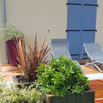 Terrasse suspendue en ipé et dalles grès ceram
