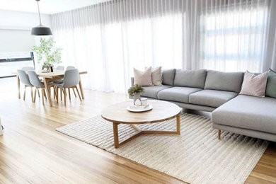 Design ideas for a modern family room in Melbourne.