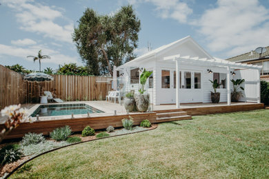 Beach style home design in Newcastle - Maitland.