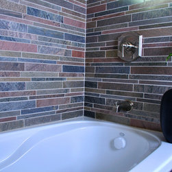 Island Stone copper quartzitic slate bathroom with linear interlock - Tile