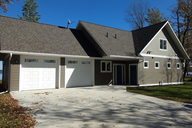 Example of a transitional exterior home design in Minneapolis