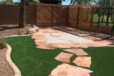 Example of a tuscan home design design in Phoenix
