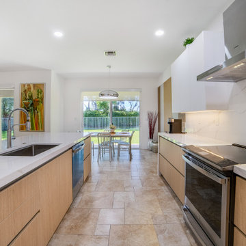 Updated Kitchen with Island and Sink Area in Contemporary Style
