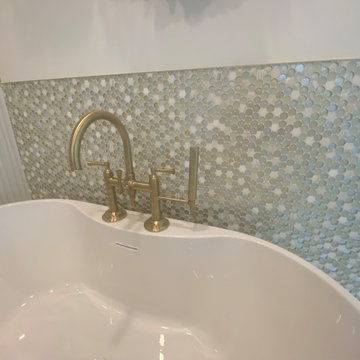 Stunning Bathroom with wavy tiles and penny round mosaic