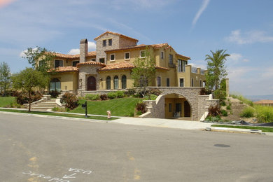 Inspiration for a mediterranean home design remodel in Orange County