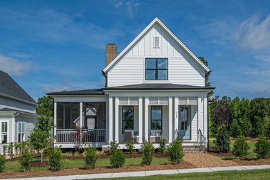 Example of a country exterior home design in Other