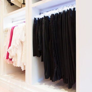 Organized Hanging Clothes in Master Closet