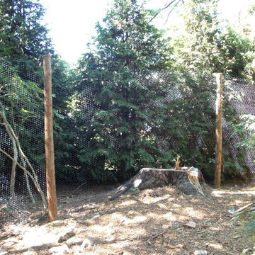 Steel Hex Web Deer Fence with Bark-On Cedar Posts