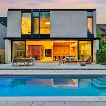 Modern home exterior with NanaWall minimal sliding glass walls