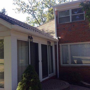 After 6 Inch Gutters and Spouts Shur-Flo Gutter Guards and New Awning Over Rear