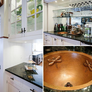 Example of a small classic home design design in Other