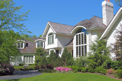 Inspiration for a timeless stucco exterior home remodel in Chicago