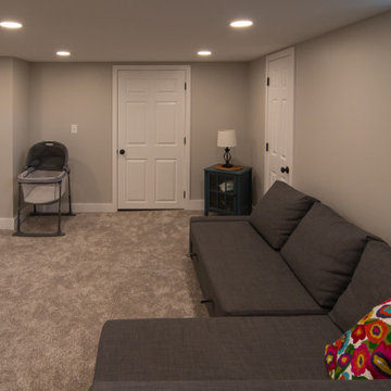 Bathroom/Laundry Room Using Warmer Tones, Accented by New Laundry Facility