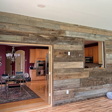 Sunroom Addition with Barnwood Feature Wall and TimberTech Antique Leather Deck