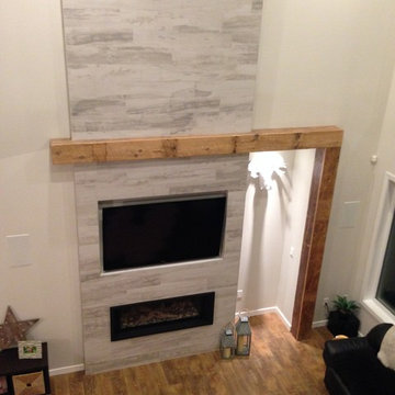Faux beam and fireplace mantle