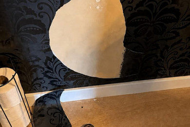 Black Damask Wallpaper Repair in a Powder Room