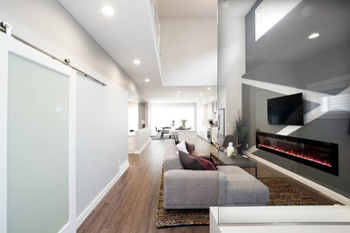 Example of a minimalist living room design in Edmonton