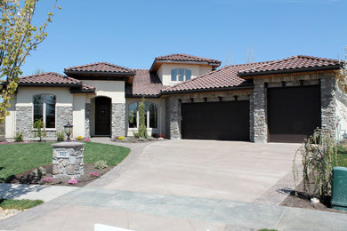 Example of a tuscan exterior home design in Boise