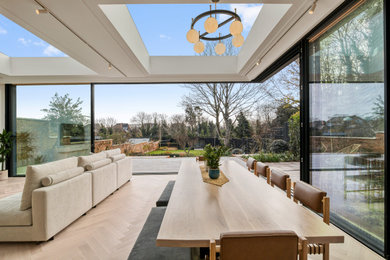 This is an example of a contemporary dining room in London.