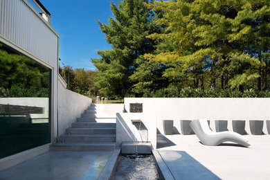 Example of a minimalist exterior home design in Other
