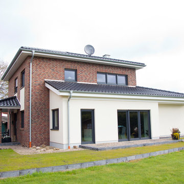 Moderne trifft Backstein - Neubau EFH