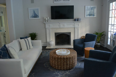 Beach style living room photo in New York