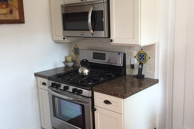 Example of a mid-sized tuscan kitchen design in Los Angeles