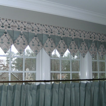 Turquois cafe curtains with complimentary valances