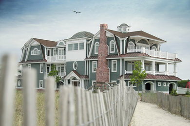 Example of a huge beach style home design design in Philadelphia