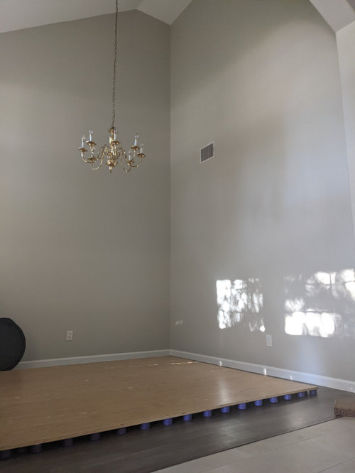 Turning 11'x11' high ceiling formal dining room into library?